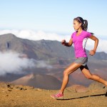 Female running athlete. Woman trail runner sprinting for success